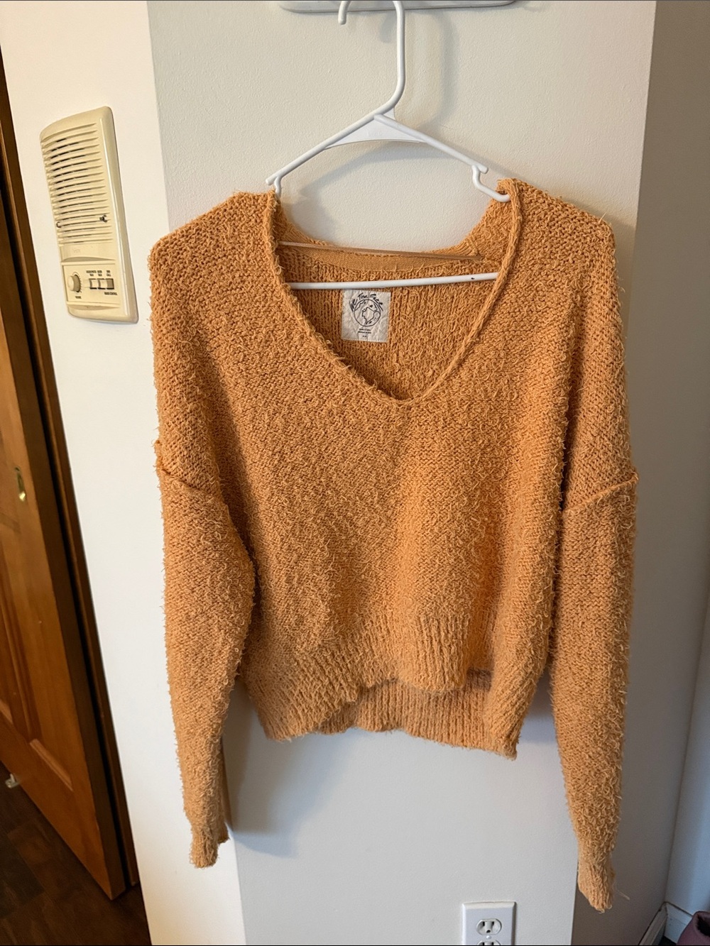 We The Free Women's V-Neck Textured Sweater in Rust